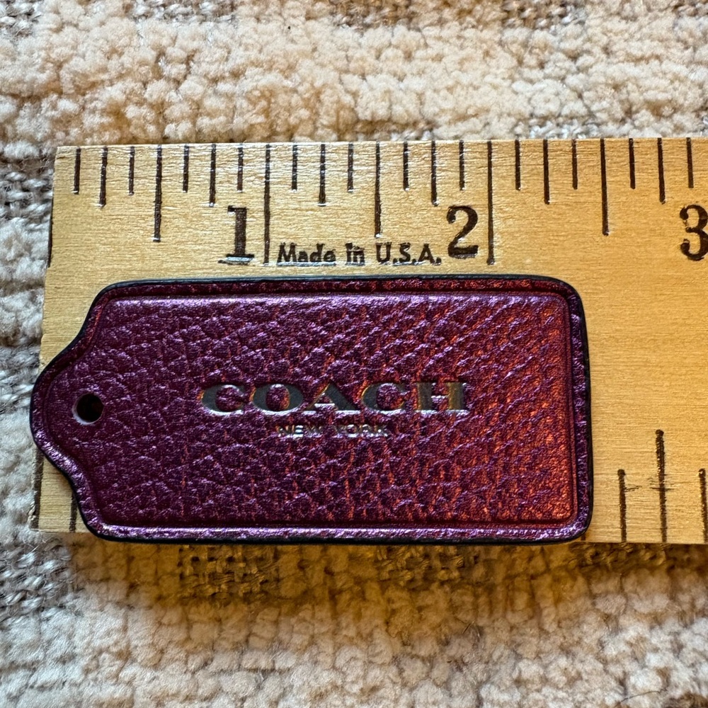 Coach Magenta Leather Tag
